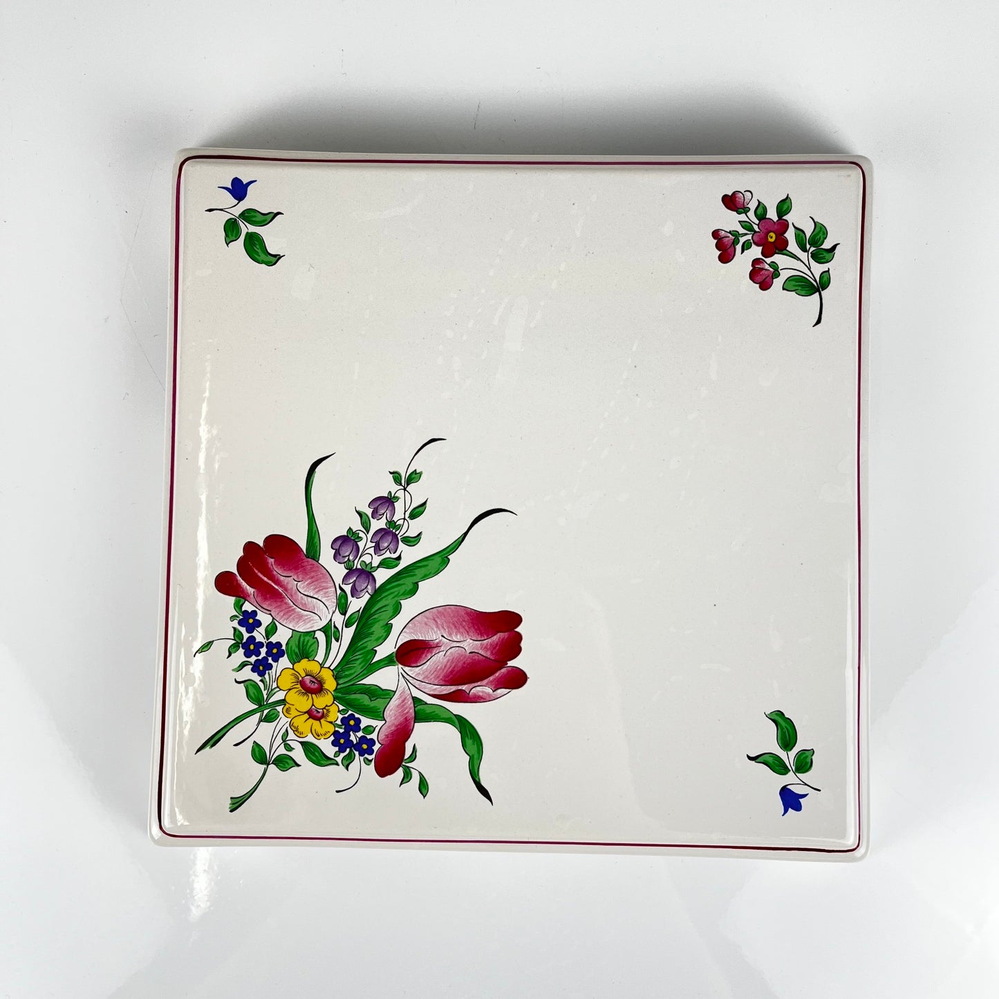 KG Lunéville trivet, "Réverbère" model, tulip pattern.