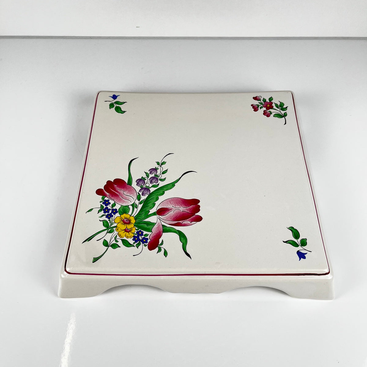 KG Lunéville trivet, "Réverbère" model, tulip pattern.