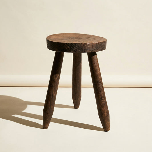 Small brutalist tripod stool in solid wood